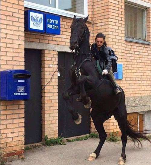 A Postgirl on horse back